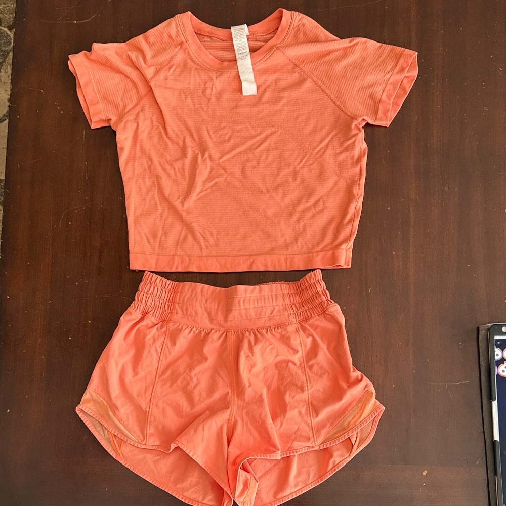 Lululemon Athletica Orange Athletic Top and shorts set